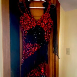 Latin/ballroom dance dress. Only worn once! Original design. Good condition